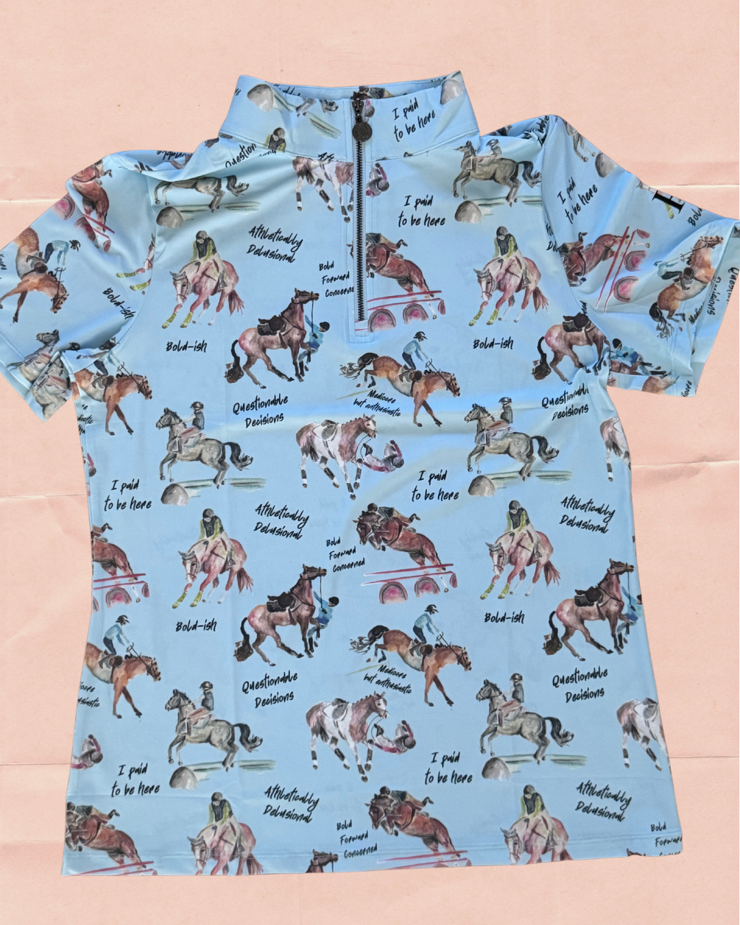 short sleeve sun shirt with riders falling off horses